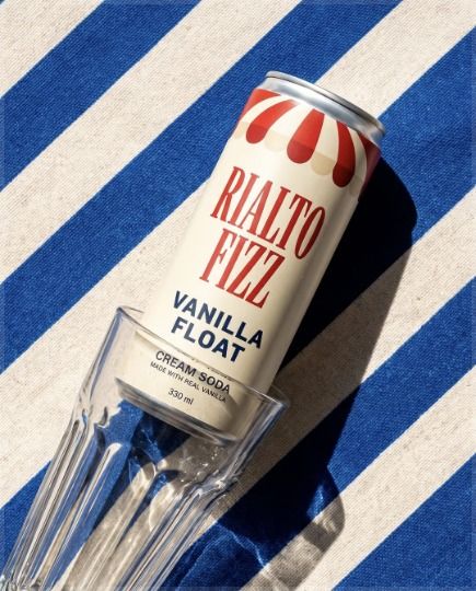 Cream soda can on a striped towel