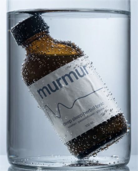 Tonic bottle in water