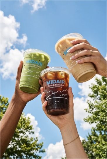 Iced drinks raised to the sky