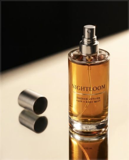 Perfume bottle in hard light